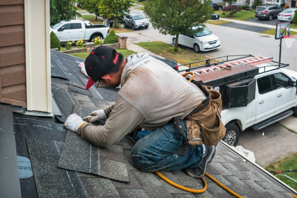 Professional Storm Damage Roof Repair technician working in Grafton, OH